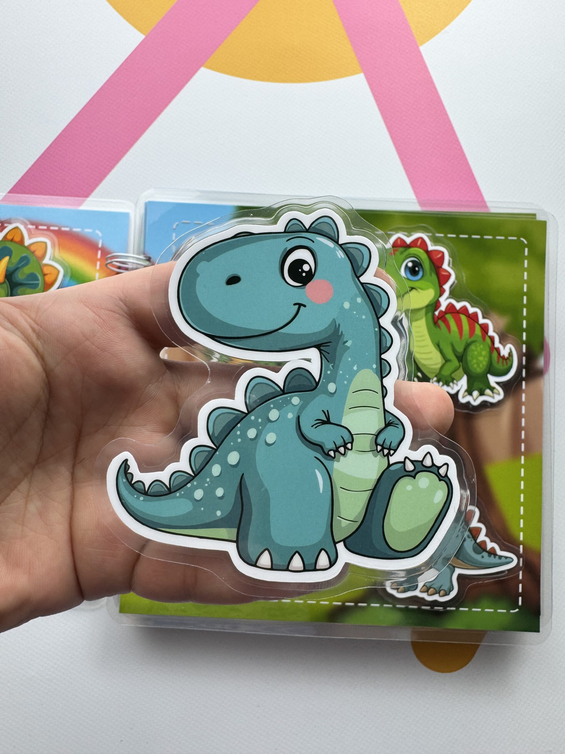 Książeczka sensoryczna Dinozaury - obrazek 13