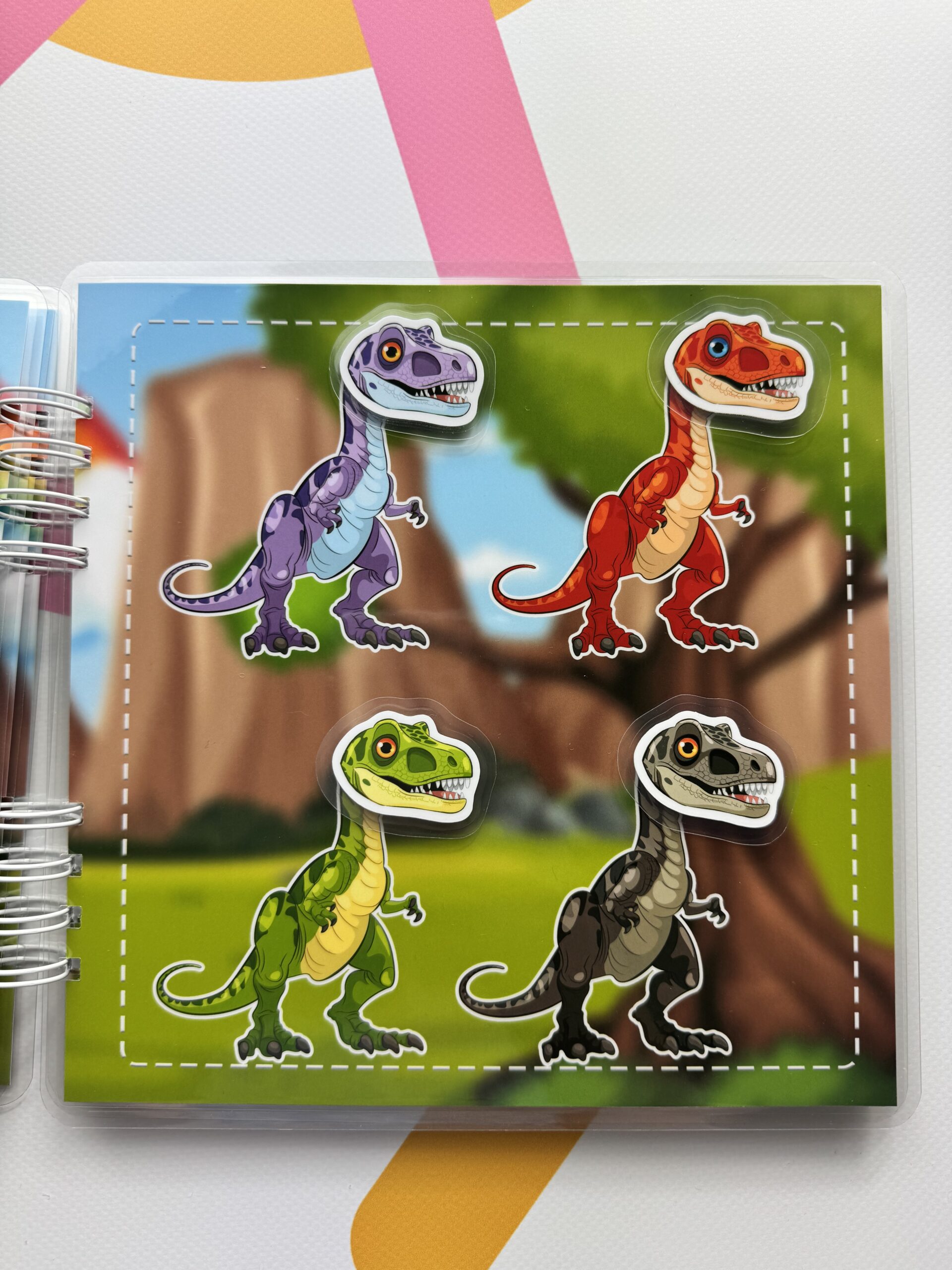 Książeczka sensoryczna Dinozaury - obrazek 6